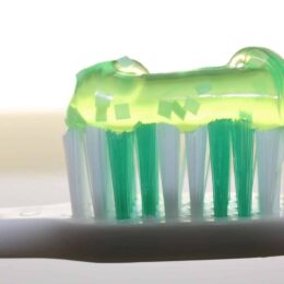 Green toothpaste on toothbrush