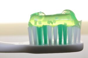 Green toothpaste on toothbrush