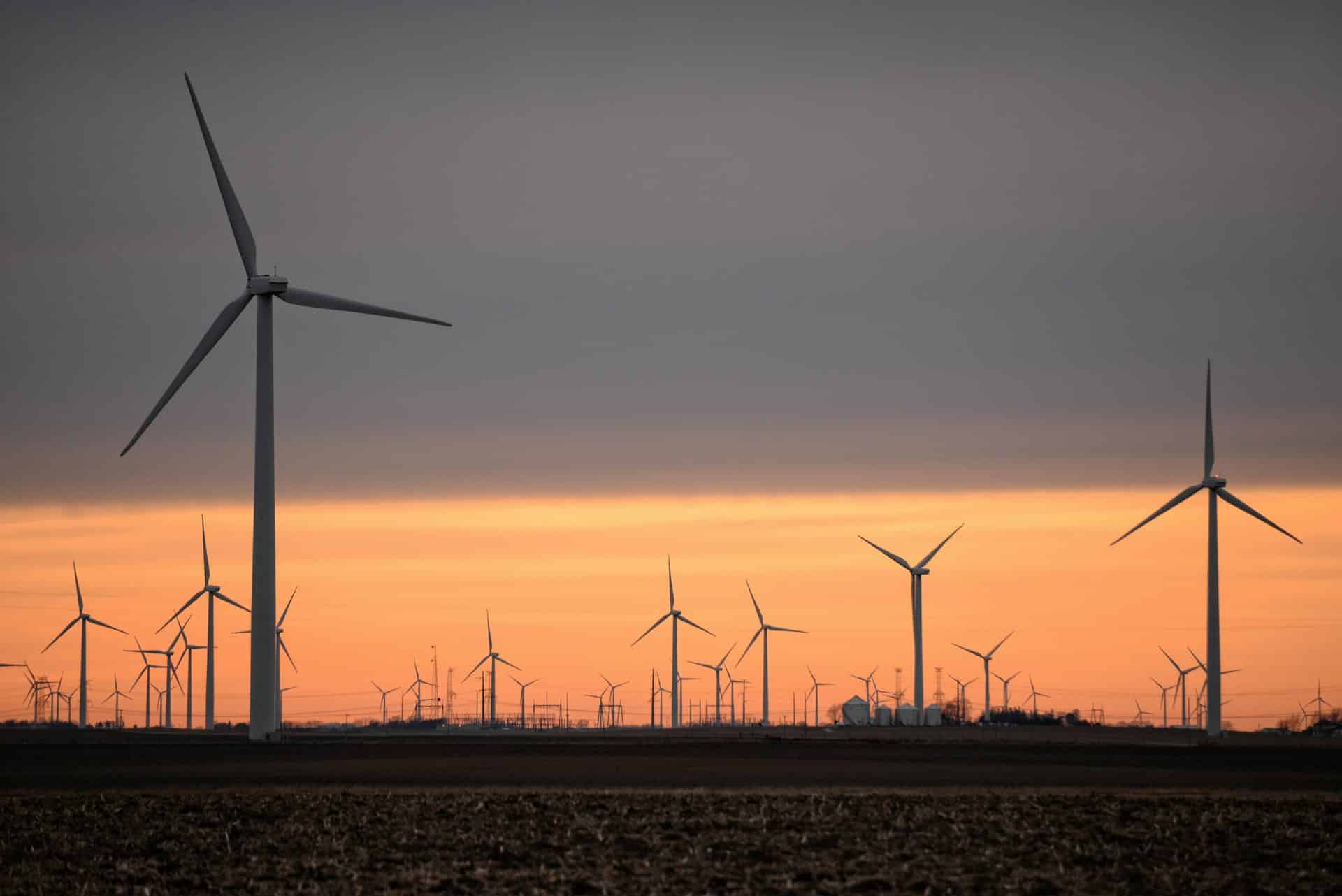 Wind turbines by sunset