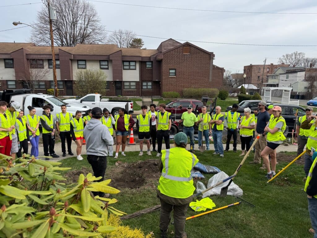 Capital Roots volunteers gathering at the beginning of their Earth Day Tree Planting.