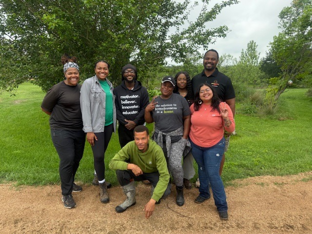A group photo of African American Youth Harvest Foundation volunteers at Casa de Miel.