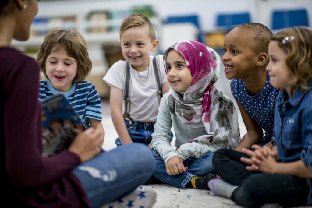 Young children learning together in the classroom