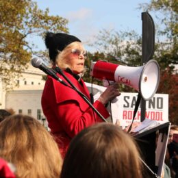 jane fonda talking into megaphone