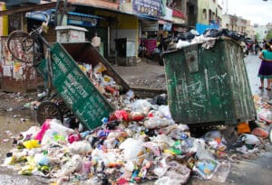 plastic pollution overflowing on street