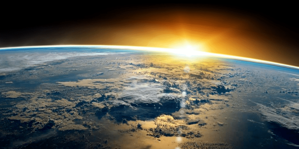Sun rising on Earth's surface